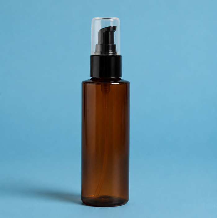 Brown spray bottle with black pump on a blue background