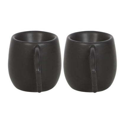 bat wing egg cups viewed end on showing compact black ceramic form
