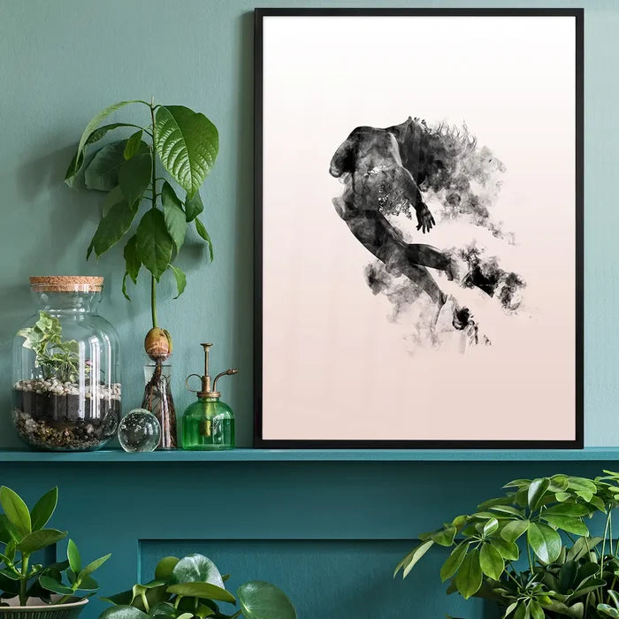Abstract female form in a dancing pose with cloud formations on a pastel pink background, framed.