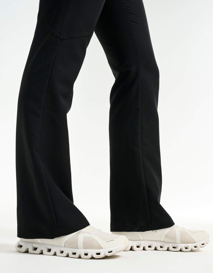 ankle of black flare scrub pants