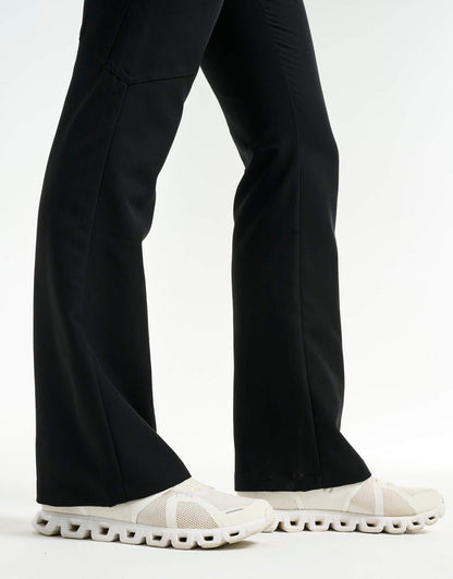 ankle of black flare scrub pants