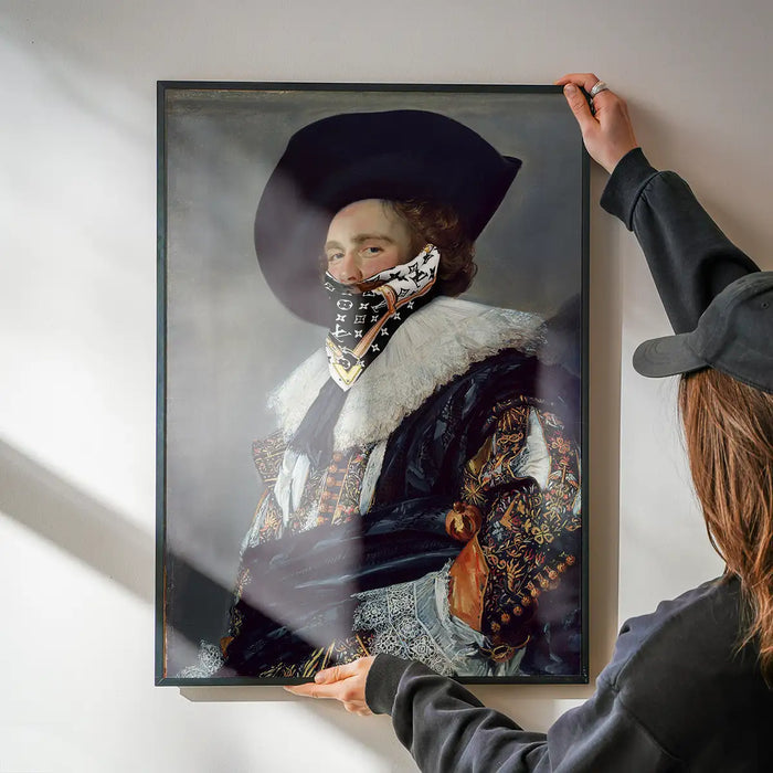 Framed art print of The Laughing Cavalier wearing a black and white Louis Vuitton scarf face mask.