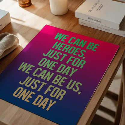 David Bowie "Heroes" lyrics print with neon green text on a vibrant pink to blue gradient background.