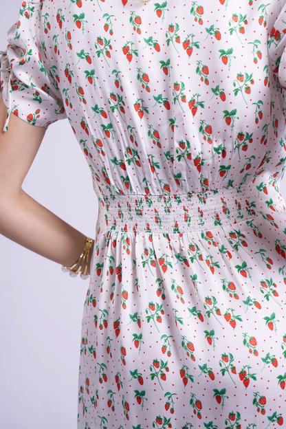 Close-up of shirred waist and strawberry print on New Day Originals Babbington Strawberries & Cream Dress, shop New Day Originals at Dotique