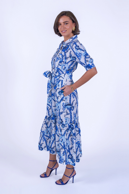 Model wearing New Day Originals Safari Blue Shirt Dress by New Day Originals, shop New Day Originals at Dotique.