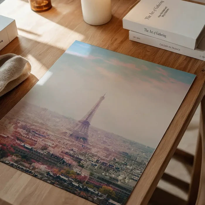 Pink-hued photographic print of the Eiffel Tower and Paris suburbs on thick archival art paper.