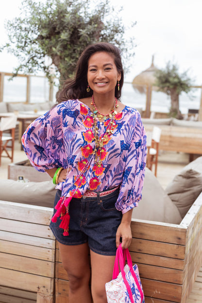 Model wearing Place Du Soleil Blue Tiger Embroidered Blouse S26-334 by Place du Soleil shop Dotique beach style outfit