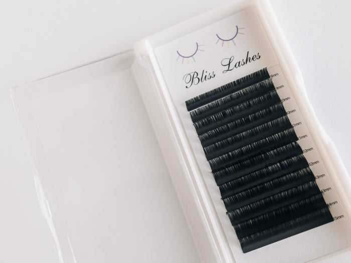 Open tray of Bliss Lashes mixed-length volume lash extensions