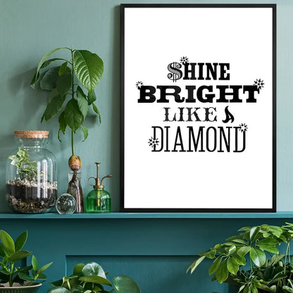Black framed "Shine Bright Like a Diamond" typographic print on white archival art paper, displayed on a teal shelf.