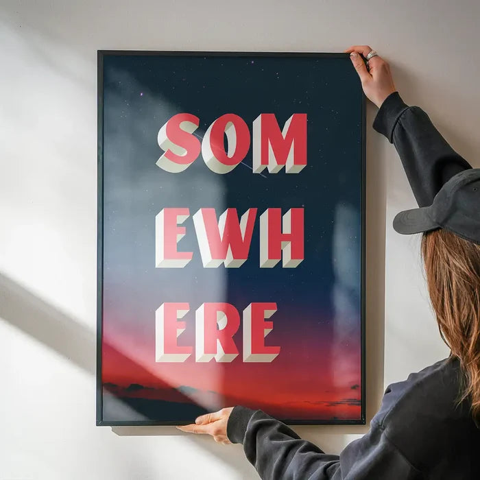 Somewhere Typography Sunset Print: Bold red and white 3D text on a vibrant blue and red sunset poster.