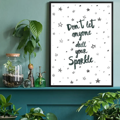 Black-framed print with "Don't Let Anyone Dull Your Sparkle" in playful script, surrounded by stars.