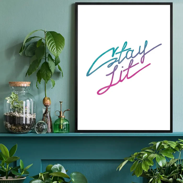 Stay Lit" quote print on archival art paper, featuring a vibrant teal-to-pink gradient script in a black frame.