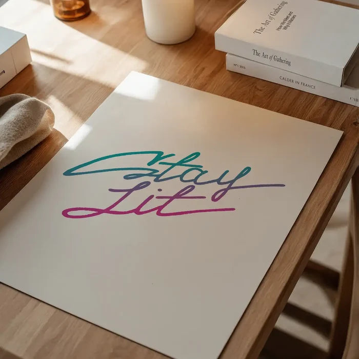 Stay Lit" quote print on thick archival art paper, featuring a vibrant teal to pink gradient script.