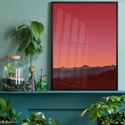 Duotone sunset graphic print on thick art paper, framed in black, displayed on a teal shelf.