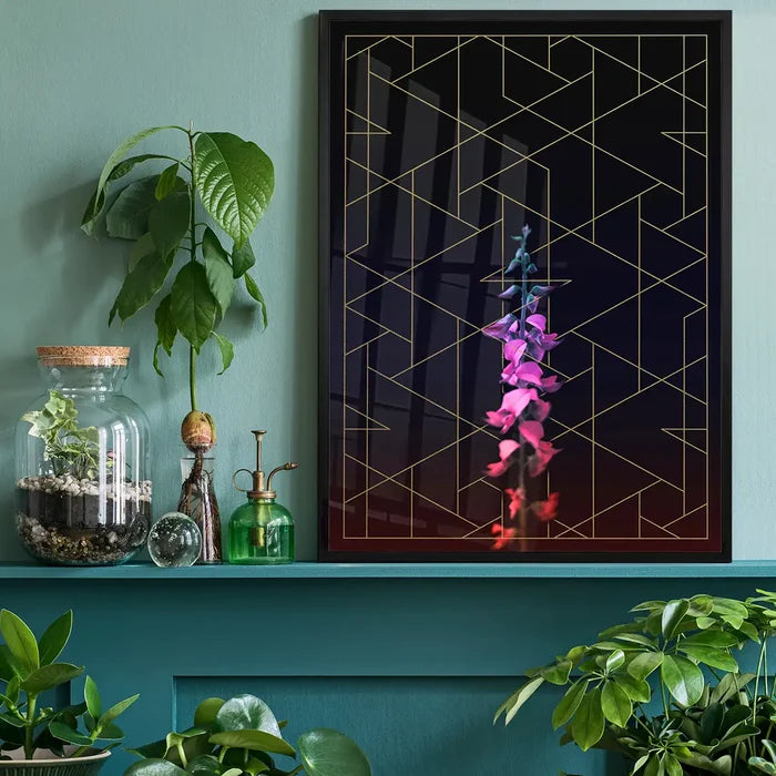 Tall flower print with pink and purple blooms, gold geometric lines, in a black frame on a green shelf.