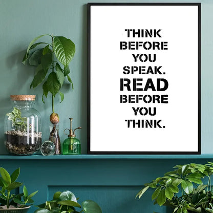 Black framed typographic print on white paper: "Think Before You Speak. Read Before You Think.