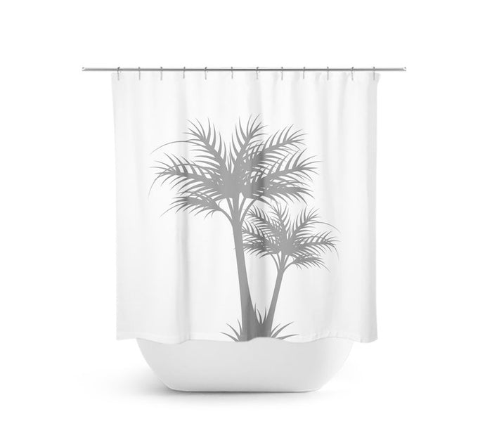 A shower curtain featuring a white background with gray palm trees printed on it.